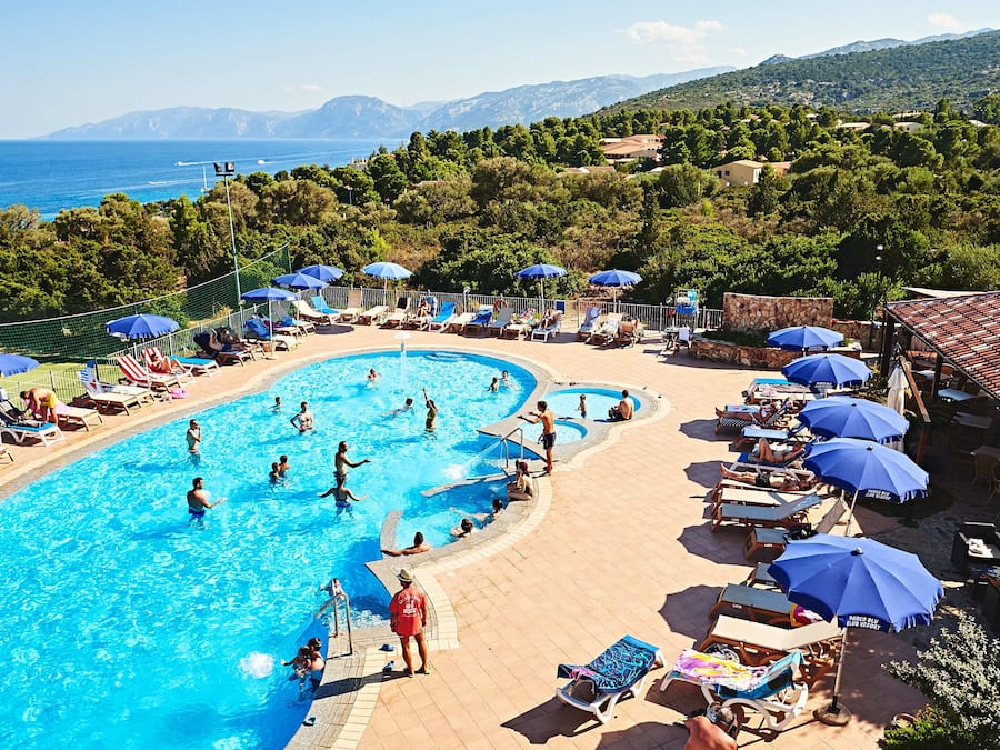 Seasonal outdoor pool, pool umbrellas, pool loungers