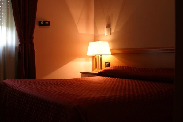 Premium bedding, minibar, desk, cots/infant beds