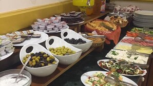 A buffet with various dishes including salads, meats, and desserts. - Berce Hotel (Istanbul)