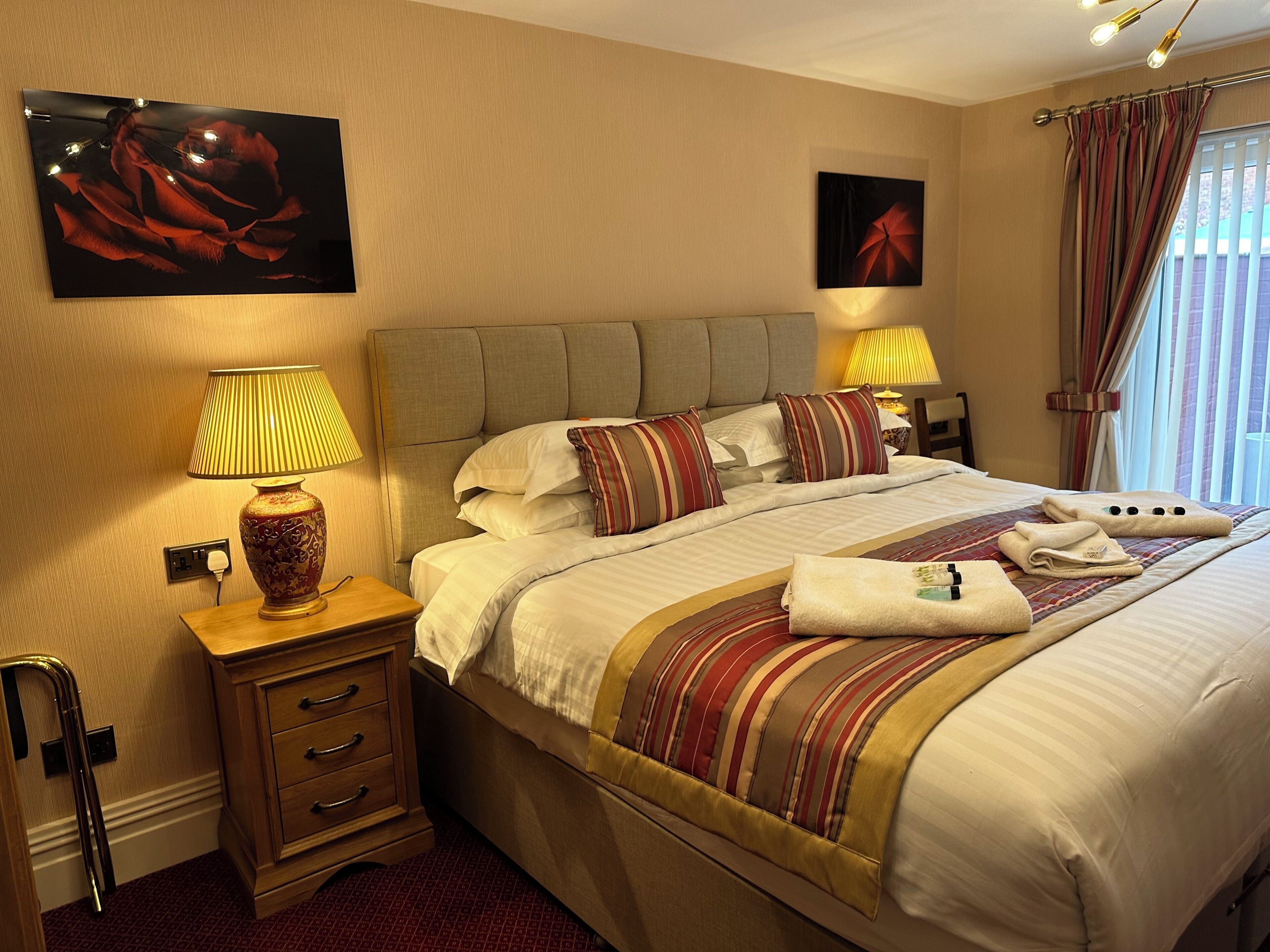 Exclusive Room, 1 King Bed, Jetted Tub, Courtyard View | Premium bedding, pillowtop beds, individually decorated