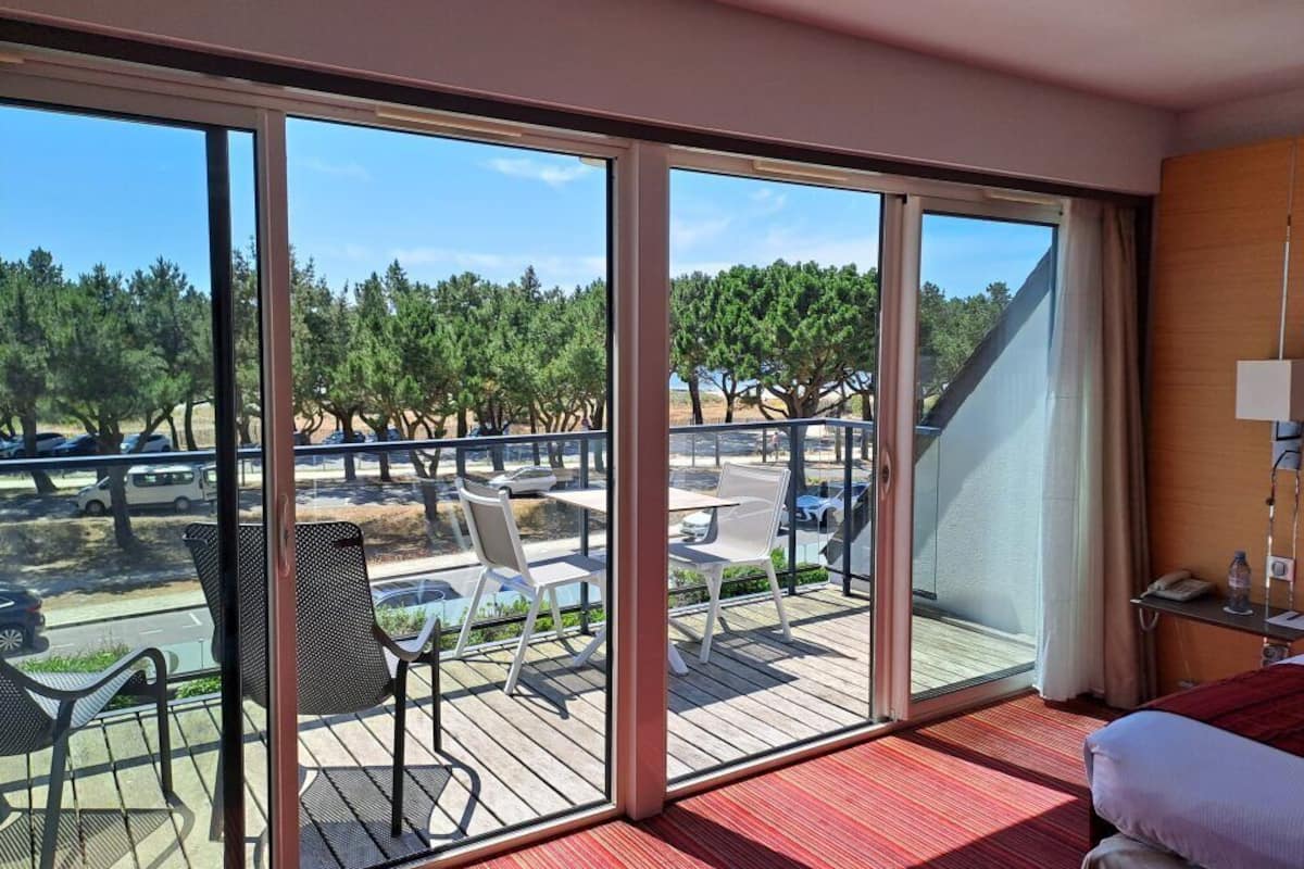 deluxe double room, terrace, sea view | minibar, in-room safe, blackout curtains, soundproofing