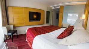 Minibar, coffres-forts dans les chambres, rideaux occultants
