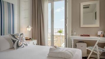 Premium bedding, down comforters, minibar, in-room safe