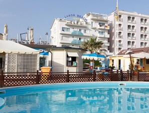 Platja privada i tovalloles de platja