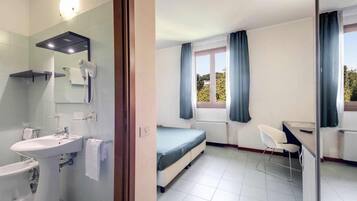 Shower, free toiletries, hair dryer, towels