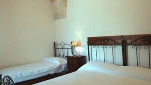 Triple Room | Pillowtop beds, in-room safe, iron/ironing board (on request) - Masseria Casa Nostra (Fasano)