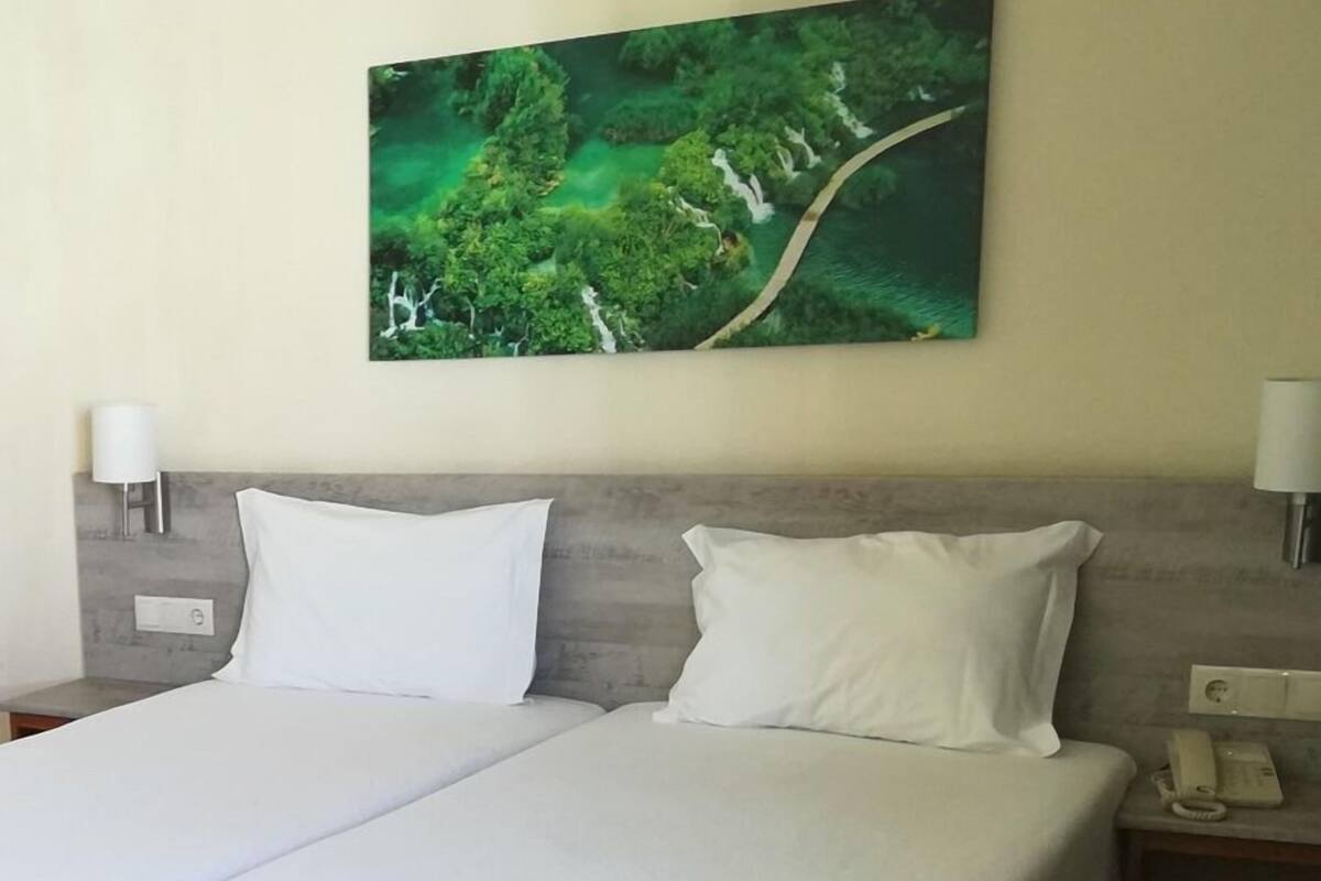 Desk, free WiFi, bed sheets