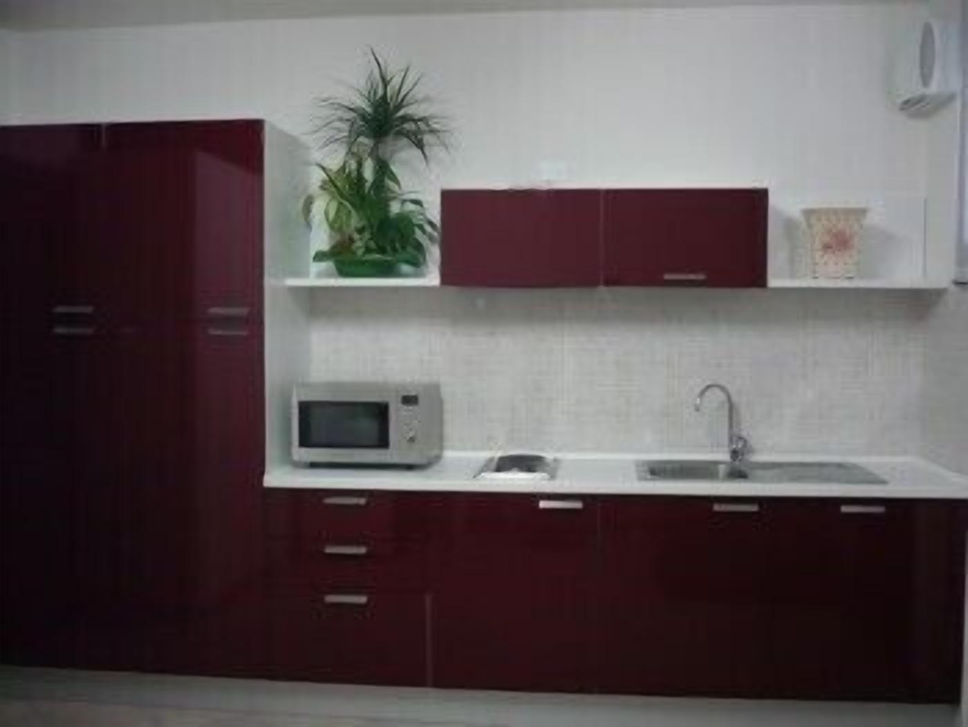 fridge, coffee/tea maker, cookware/dishes/utensils