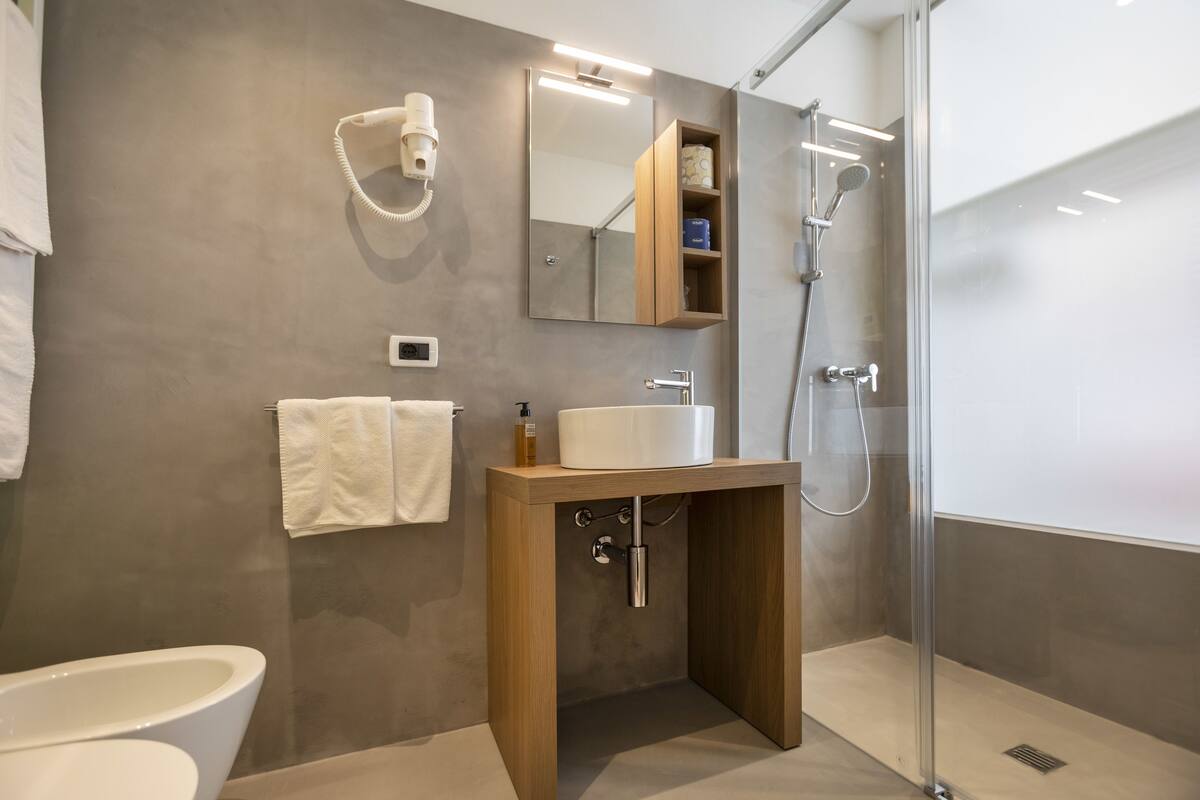 double room, lake view | bathroom | shower, free toiletries, hair dryer, bidet