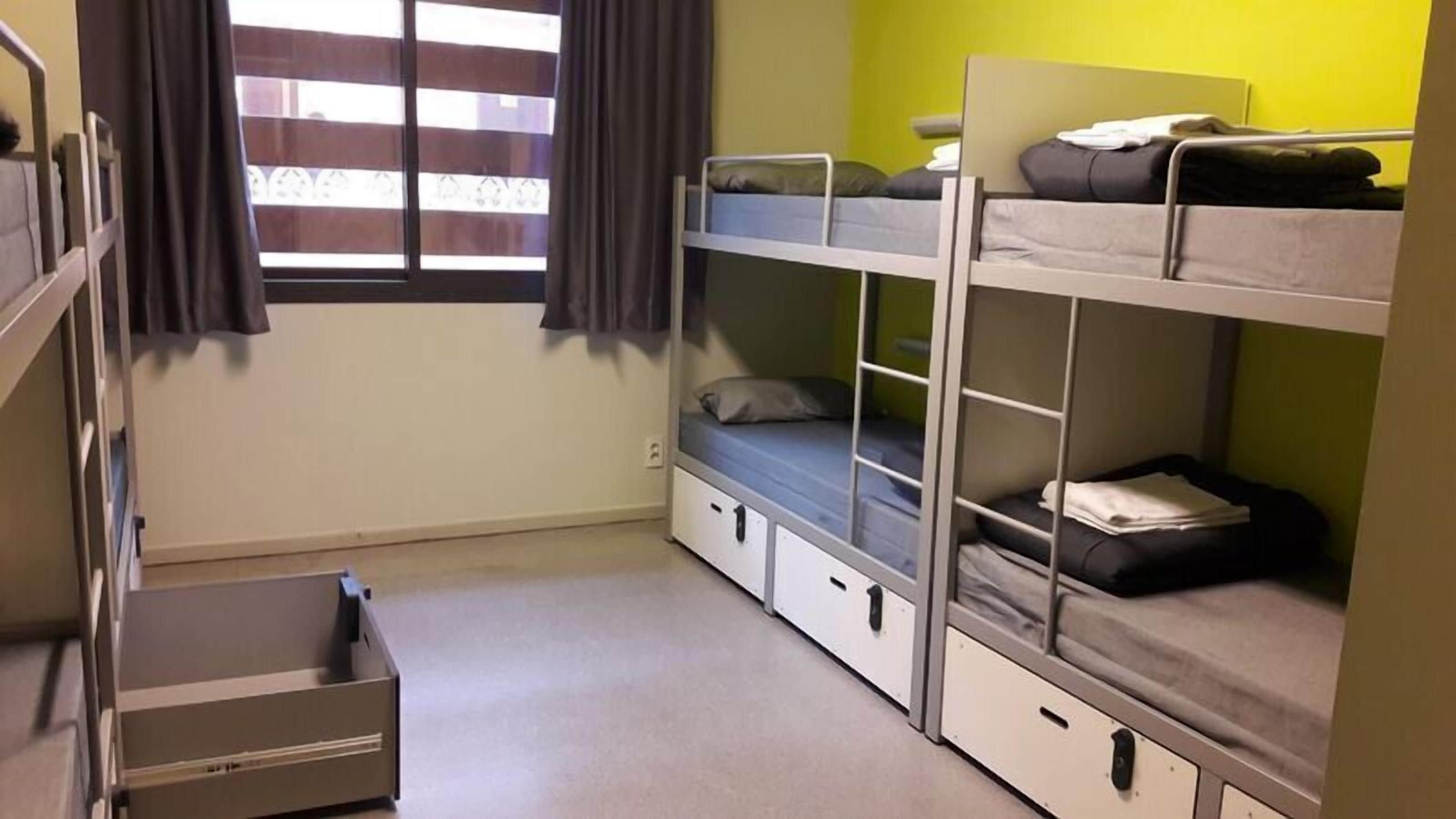 Blackout curtains, soundproofing, free WiFi, bed sheets