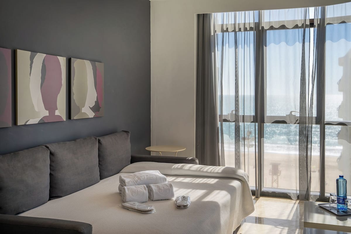 apartment, 1 bedroom, sea view | down duvets, minibar, in-room safe, desk