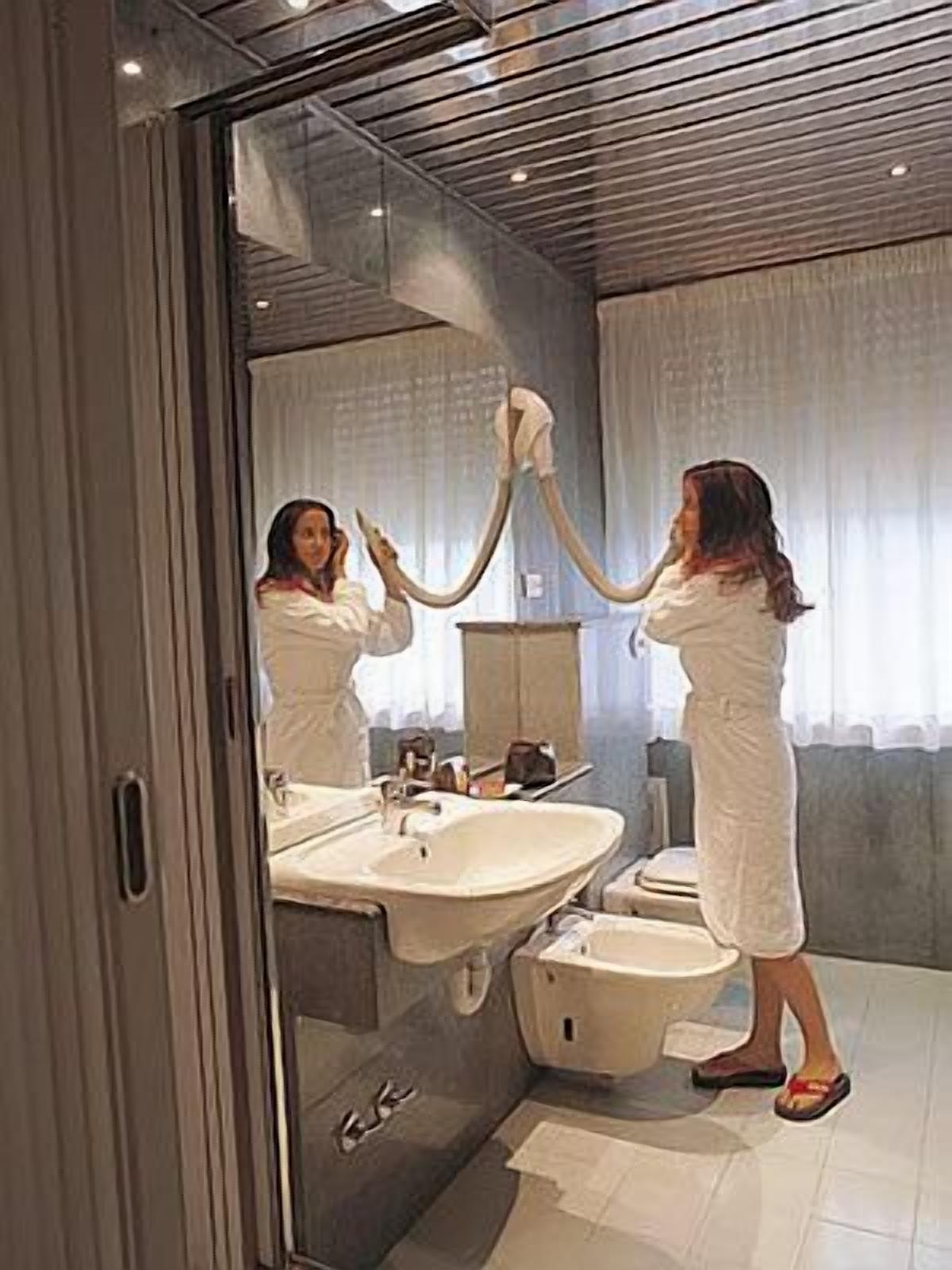 shower, free toiletries, hair dryer, bidet