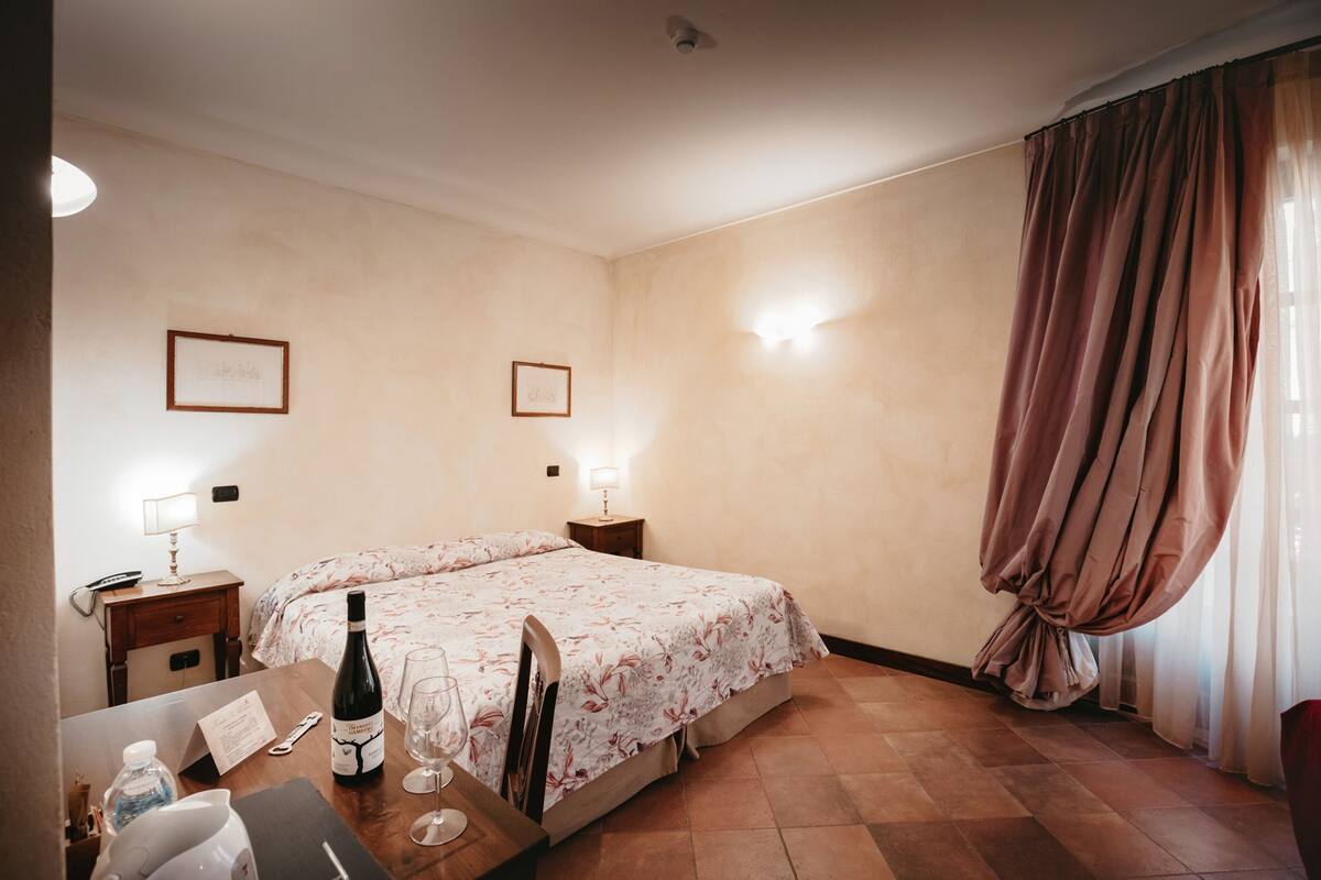Classic Double Room, Accessible | Minibar, individually decorated, desk, iron/ironing board
