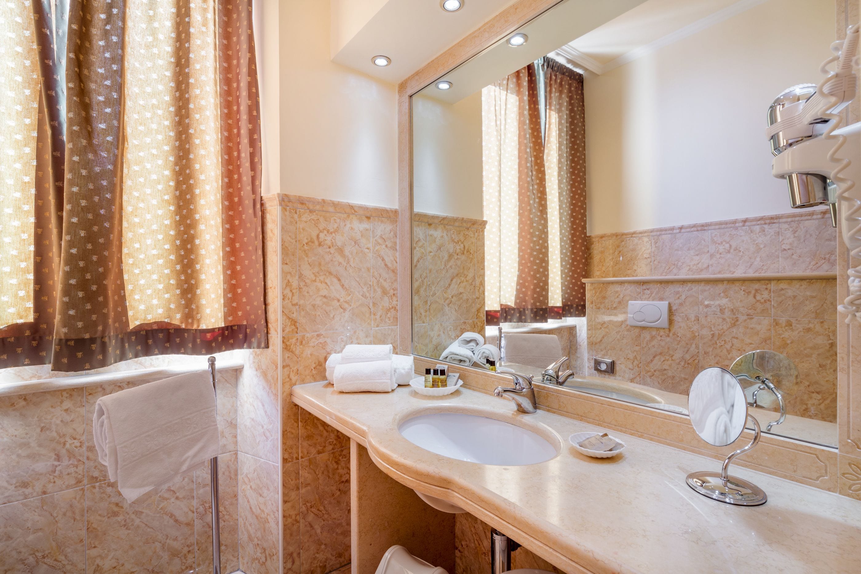 free toiletries, hair dryer, bidet, towels