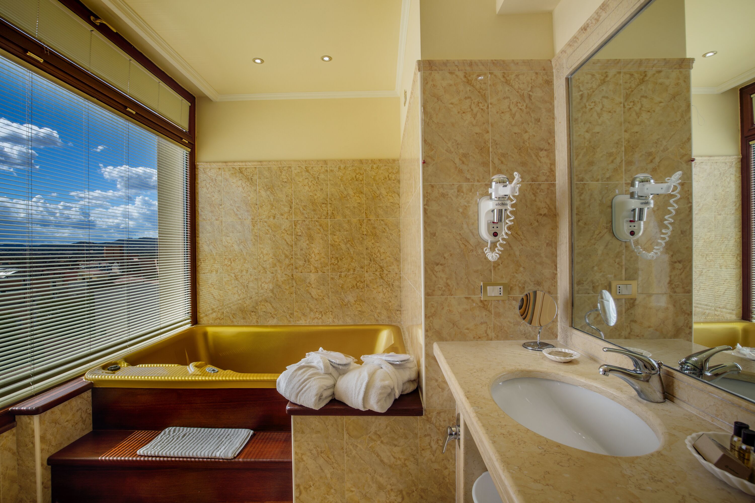 free toiletries, hair dryer, bidet, towels