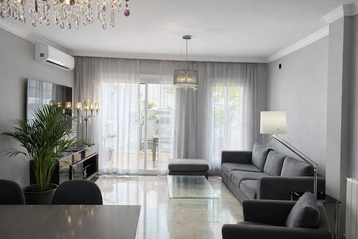 Exclusive Apartment | Living area | 32-inch TV with digital channels