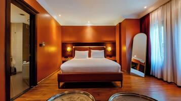 Chambre Confort, vue sur le jardin | Literie de qualité, minibar, coffre-fort, bureau