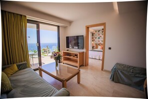 Standard Apartment, Sea View | Living room | 42-inch flat-screen TV with digital channels - Serenity Amadores (Mogan)