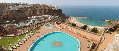 2 outdoor pools, open 9:00 AM to 9:00 PM, pool umbrellas, sun loungers