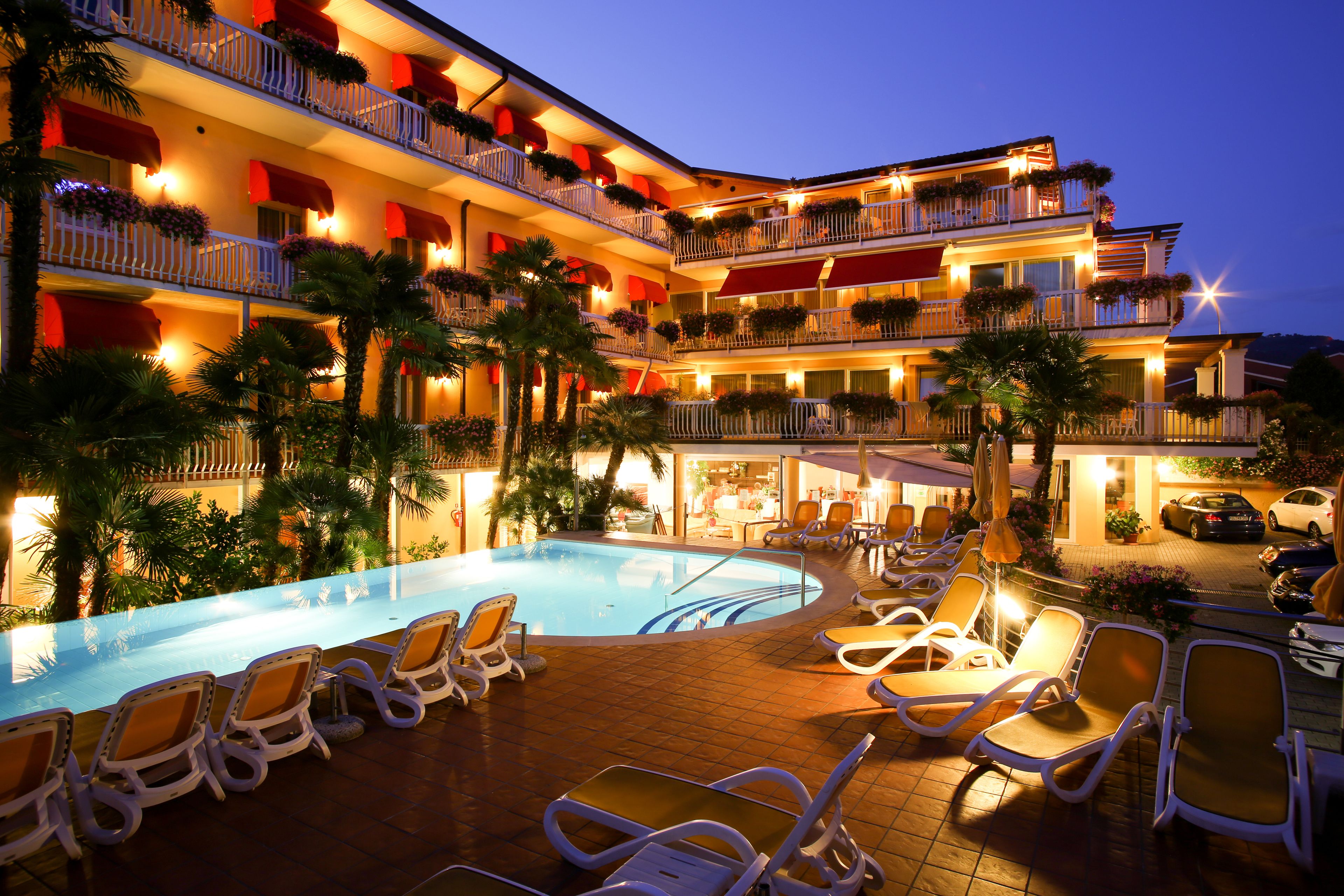 outdoor pool, pool umbrellas, pool loungers