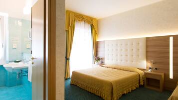Down duvets, minibar, in-room safe, desk