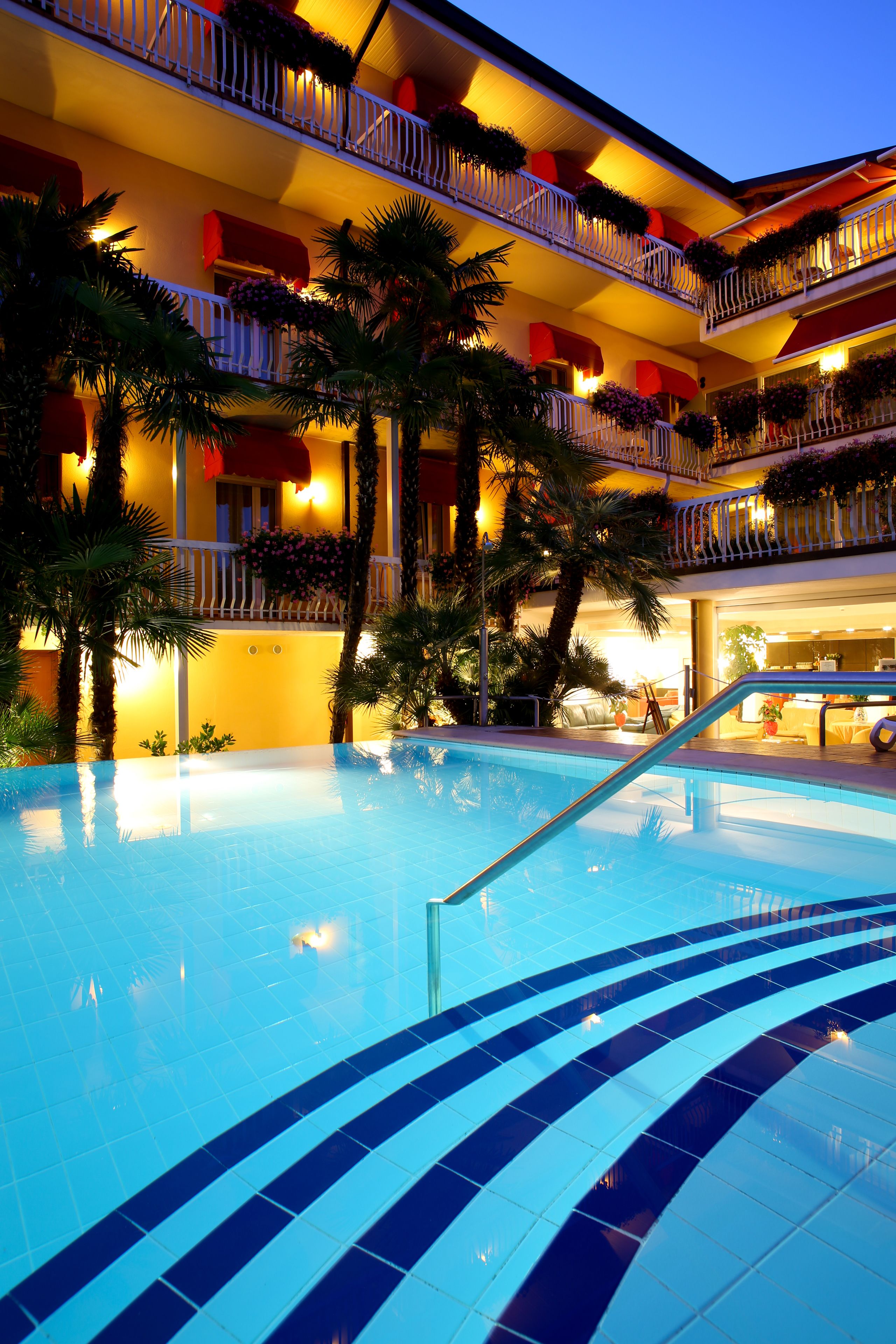 outdoor pool, pool umbrellas, pool loungers