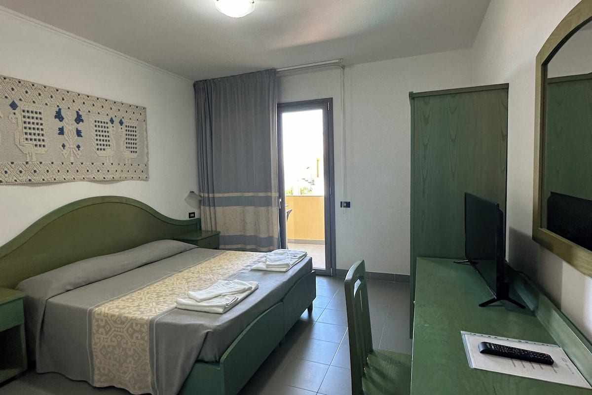 Camera Standard con letto matrimoniale o 2 letti singoli | Minibar, una cassaforte in camera, con arredamento individuale