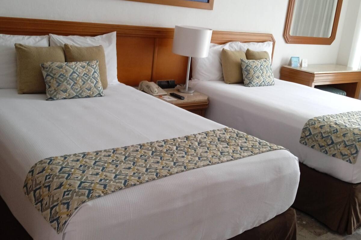 Couette en duvet d'oie, minibar, coffres-forts dans les chambres