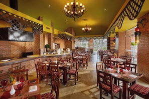 Breakfast, lunch, dinner served; international cuisine, pool views