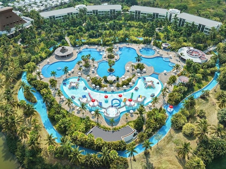 Outdoor pool, open 8:00 AM to 8:00 PM, pool umbrellas, pool loungers. Ocean Breeze Acapulco