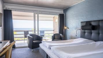 Standard Double Room, 1 Queen Bed, Ocean View | Desk, iron/ironing board, cots/infant beds, free WiFi