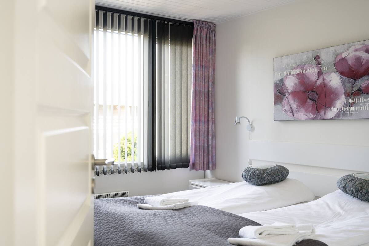 Quadruple Room | Desk, iron/ironing board (on request), cribs (surcharge), WiFi (free)