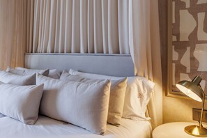 Colchones con pillow-top, minibar y caja de seguridad en la habitación 
