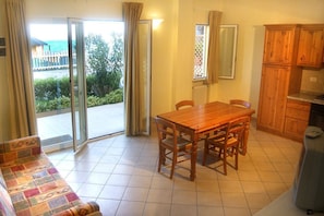 Comfort Apartment, 1 Bedroom, Patio, Sea View | Living area | 40-inch Smart TV with satellite channels
