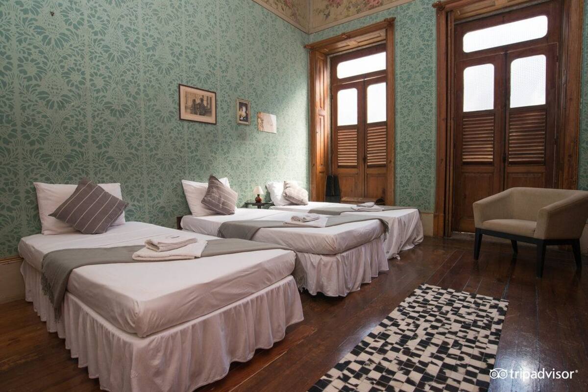 Standard Triple Room, Shared Bathroom | Minibar, WiFi (free), bed sheets