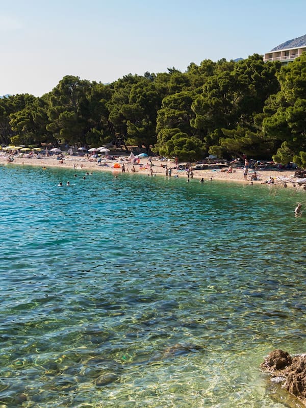 On the beach, sun-loungers, beach umbrellas, scuba diving