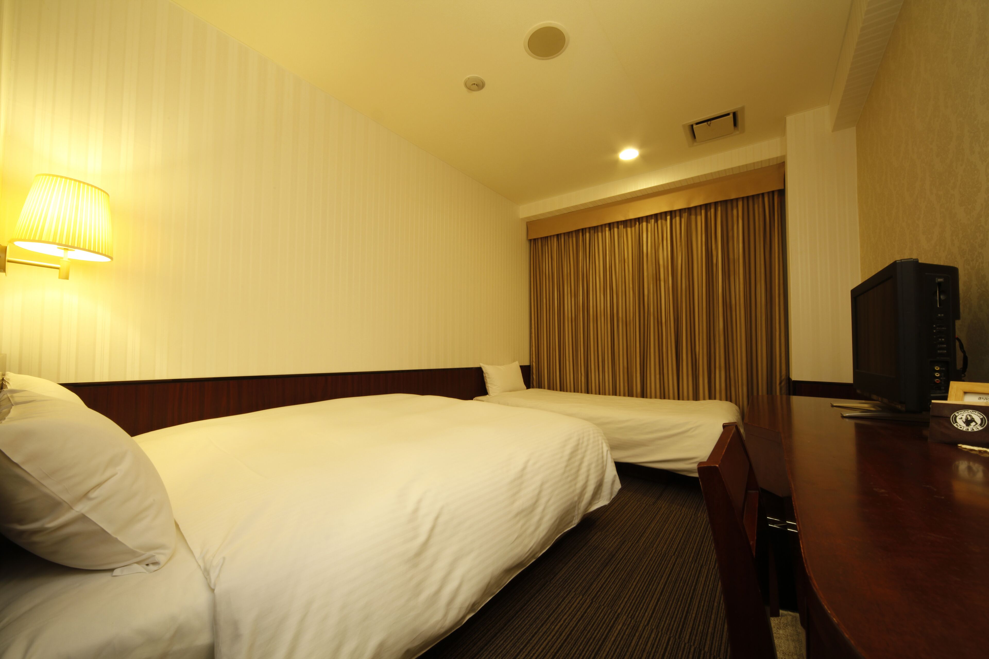 premium bedding, desk, blackout curtains, free wired internet