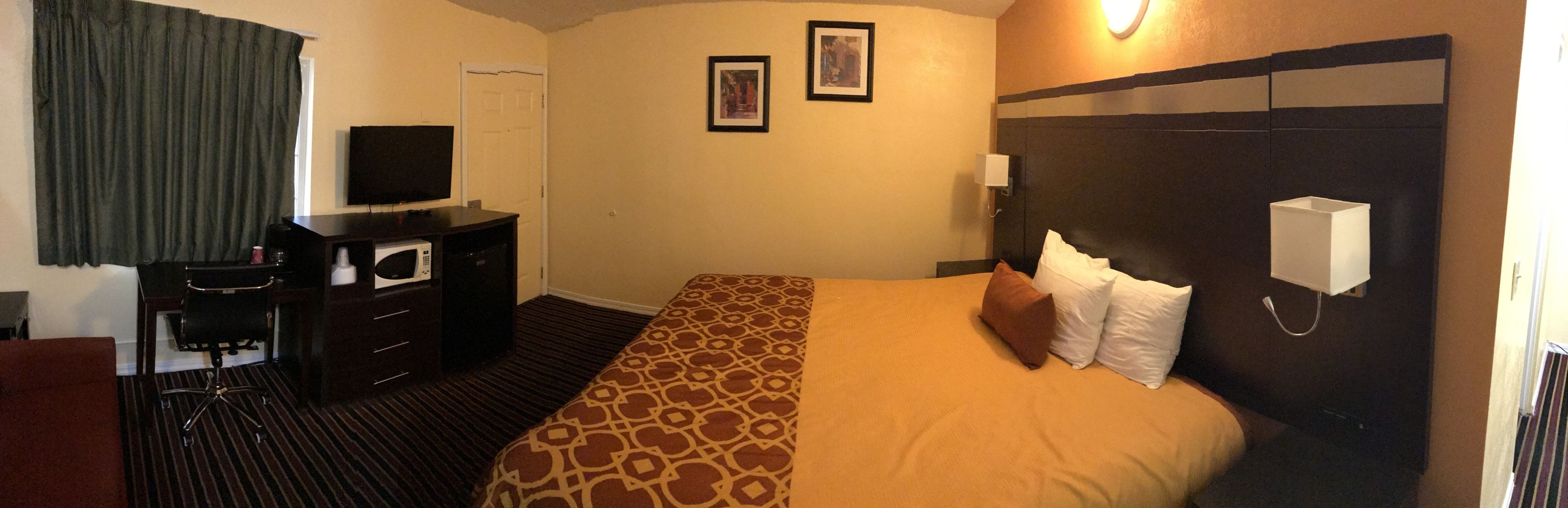 standard room, 1 king bed | premium bedding, individually decorated, desk, blackout curtains