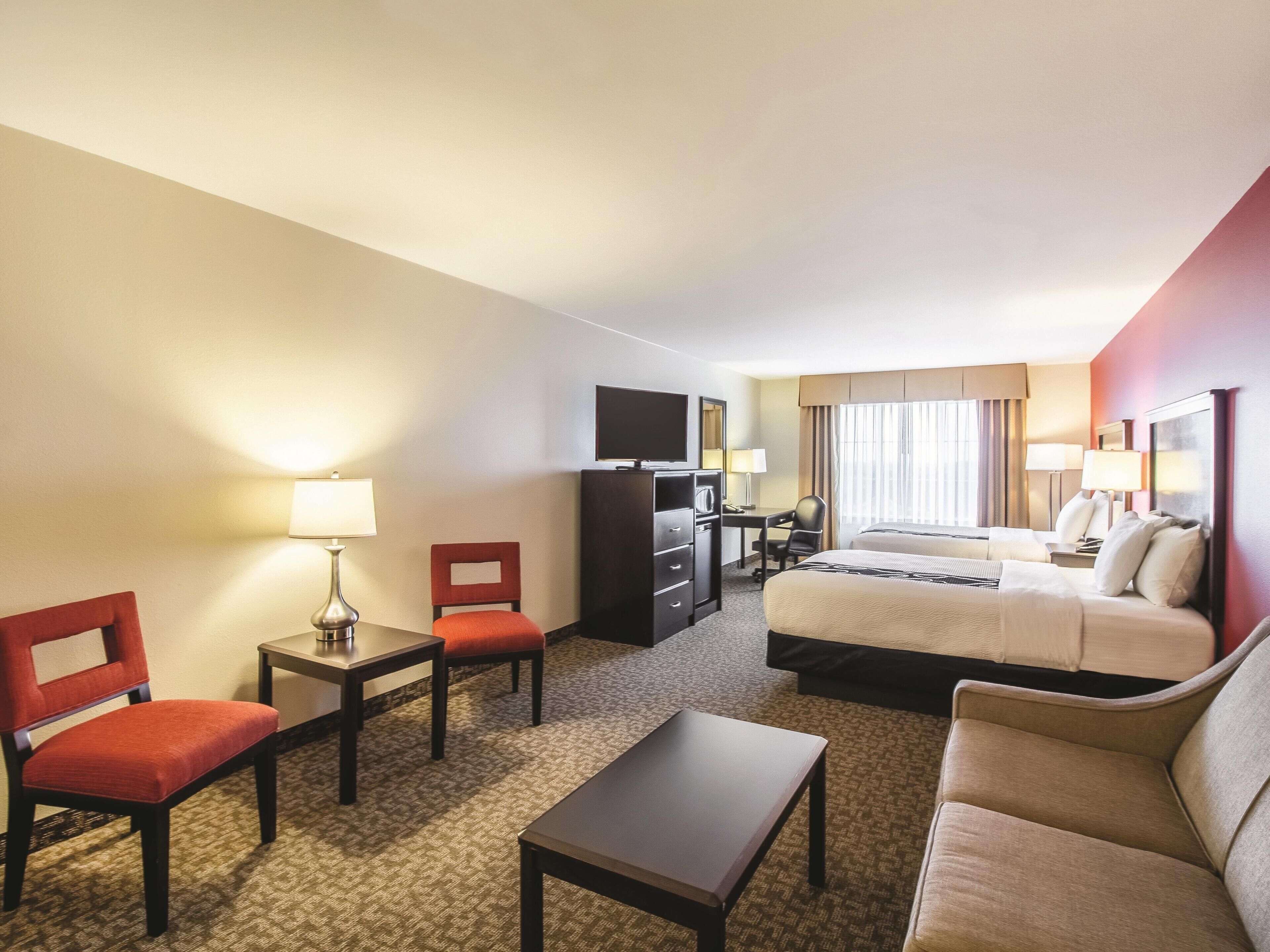 Deluxe Suite, 2 Queen Beds, Non Smoking | Premium bedding, down comforters, desk, blackout drapes