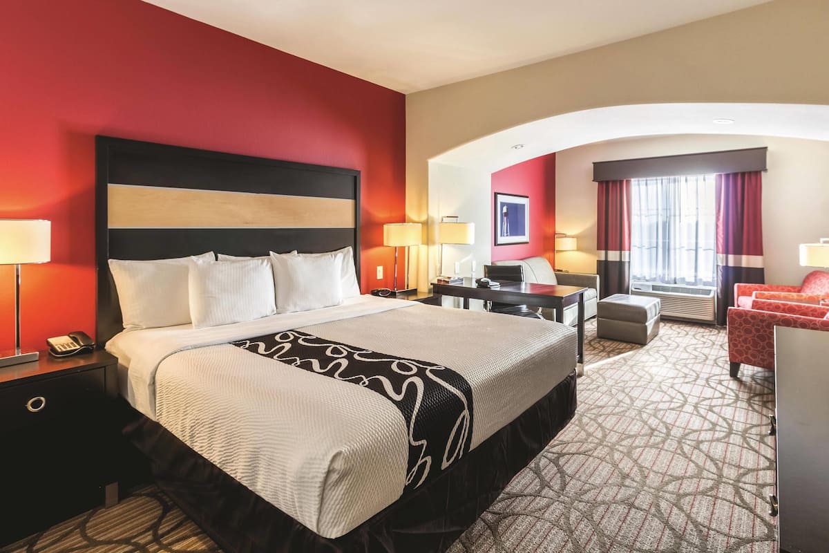 Deluxe Suite, 1 King Bed, Non Smoking | Premium bedding, down comforters, desk, blackout drapes