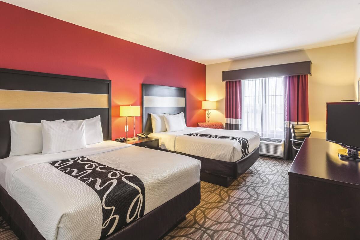 Premium bedding, down comforters, desk, blackout drapes