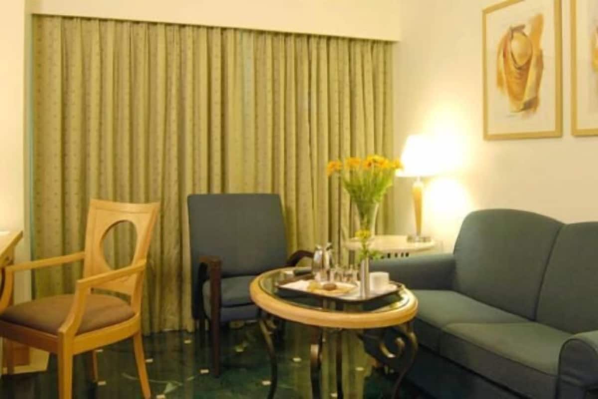 executive room | living area | 32-inch lcd tv with satellite channels, tv, dvd player