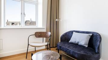 Hypo-allergenic bedding, pillow-top beds, desk, blackout curtains