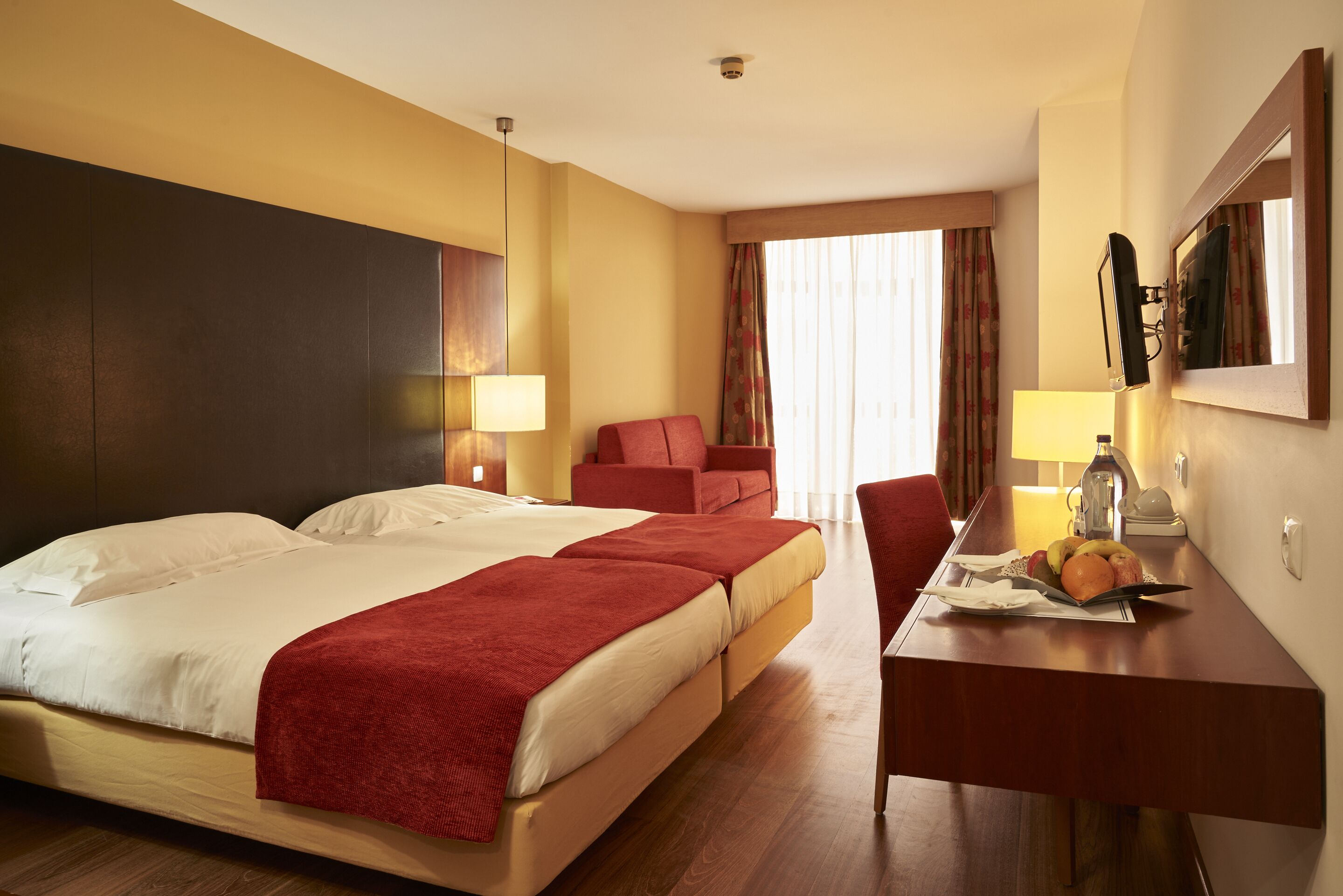 family room | 1 bedroom, down duvets, minibar, in-room safe