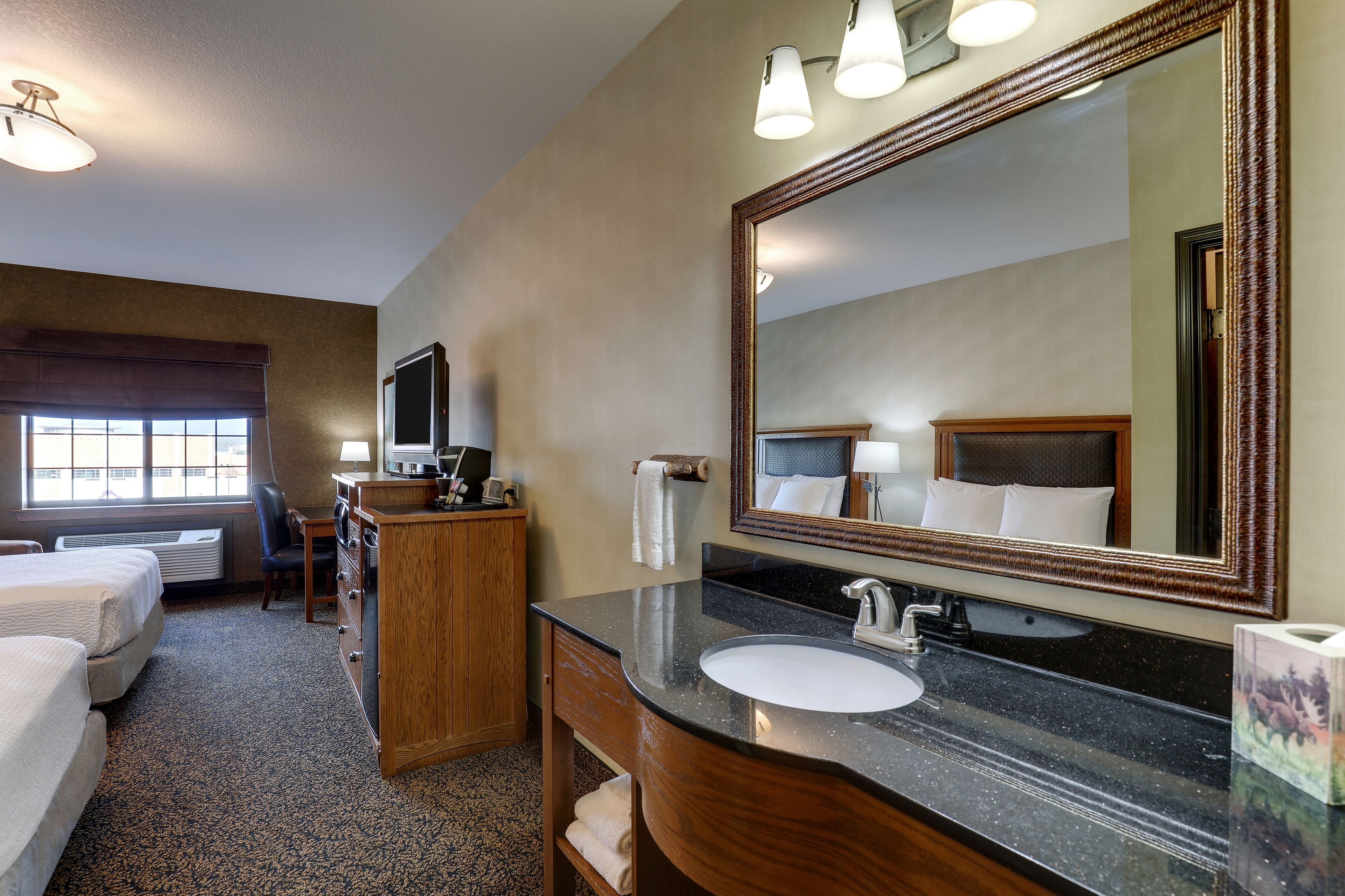 deluxe room, 2 queen beds, non smoking | bathroom | shower, free toiletries, hair dryer, towels