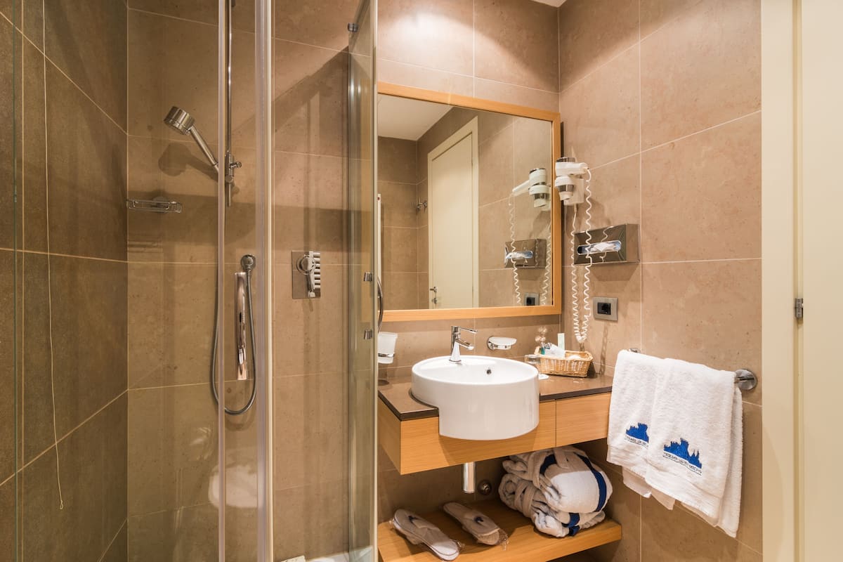 shower, free toiletries, hair dryer, bathrobes