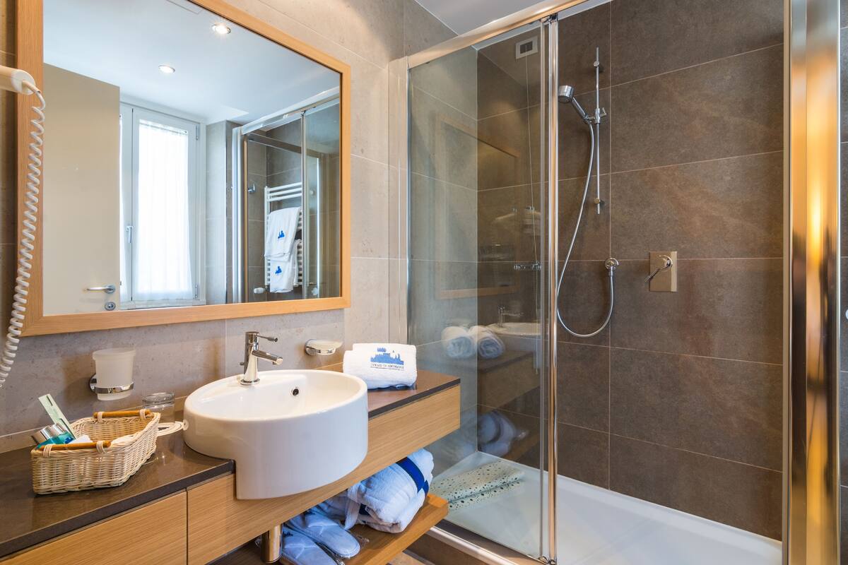 shower, free toiletries, hair dryer, bathrobes