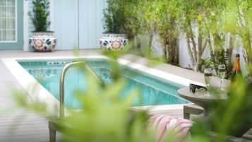 Outdoor pool, pool umbrellas, pool loungers
