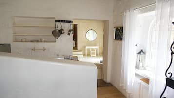 Carriage House Suite | Sábanas de algodón egipcio y ropa de cama de alta calidad