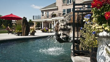 Outdoor pool, pool umbrellas, sun loungers